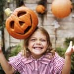 girl with jack-o-lantern